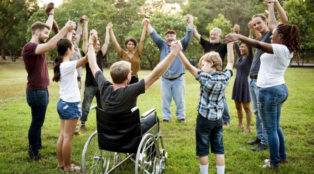 Group-of-people-holding-hand-together-in-the-park-1024x569